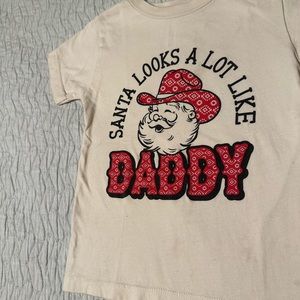 Kids “Santa looks a lot like Daddy  Bella + Canvas kids t-shirt. Size 3t